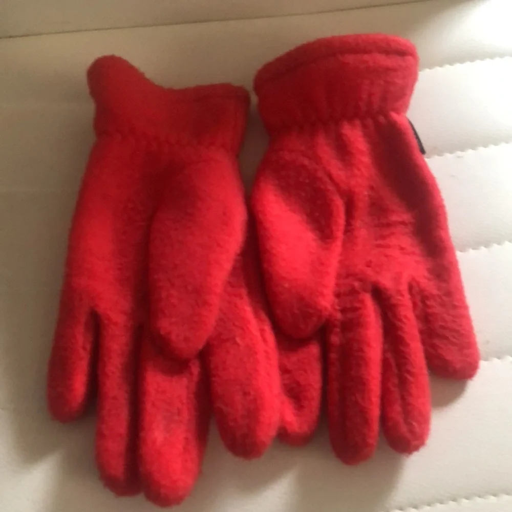 Red fleece gloves by Reebok warm good condition